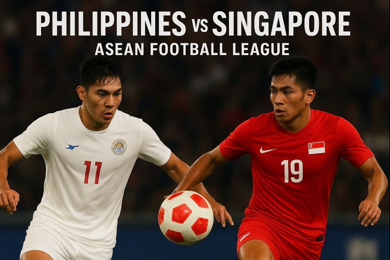 Philippines and Singapore football players battling for possession during a high-intensity ASEAN Football League match.